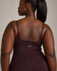 SoftMotion™ Strappy Mid Vest with Built in Bra Shelf with Grey Logo | Plum Brown