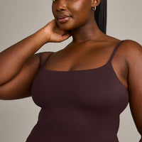 SoftMotion™ Strappy Mid Vest with Built in Bra Shelf with Grey Logo | Plum Brown