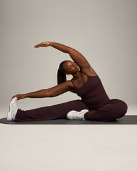 SoftMotion™ Strappy Mid Vest with Built in Bra Shelf with Grey Logo | Plum Brown