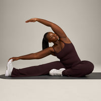 SoftMotion™ Strappy Mid Vest with Built in Bra Shelf with Grey Logo | Plum Brown