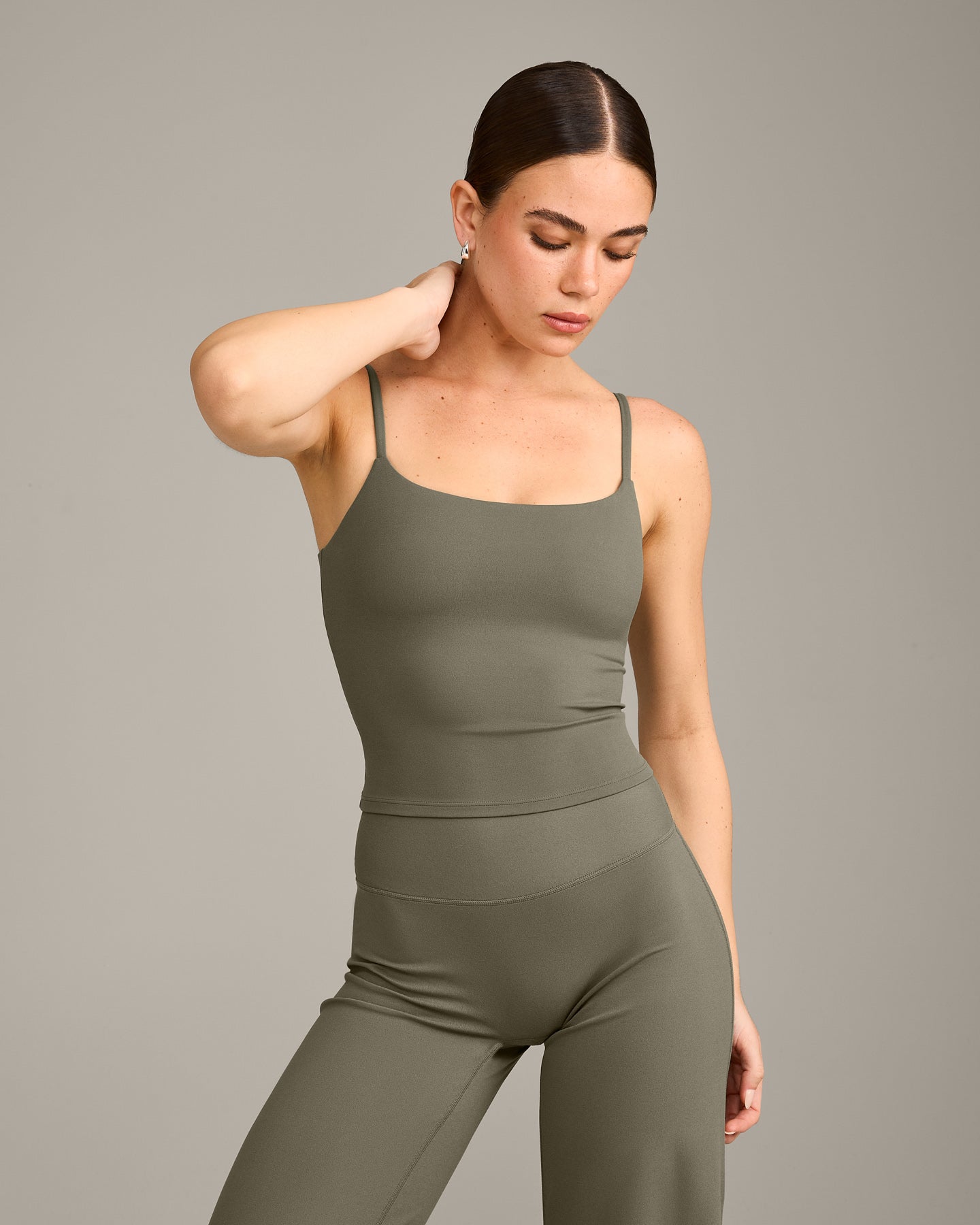 SoftMotion™ Strappy Mid Vest with Built in Bra Shelf with Grey Logo | Alpine Green