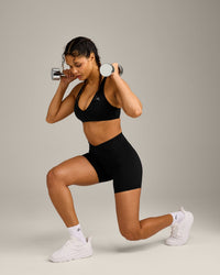 UnifiedMove™ Wrap Shorts 6" with Reflective Logo | Black
