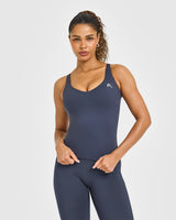 Unified V Neck Cross Back Vest White Logo | True Blue