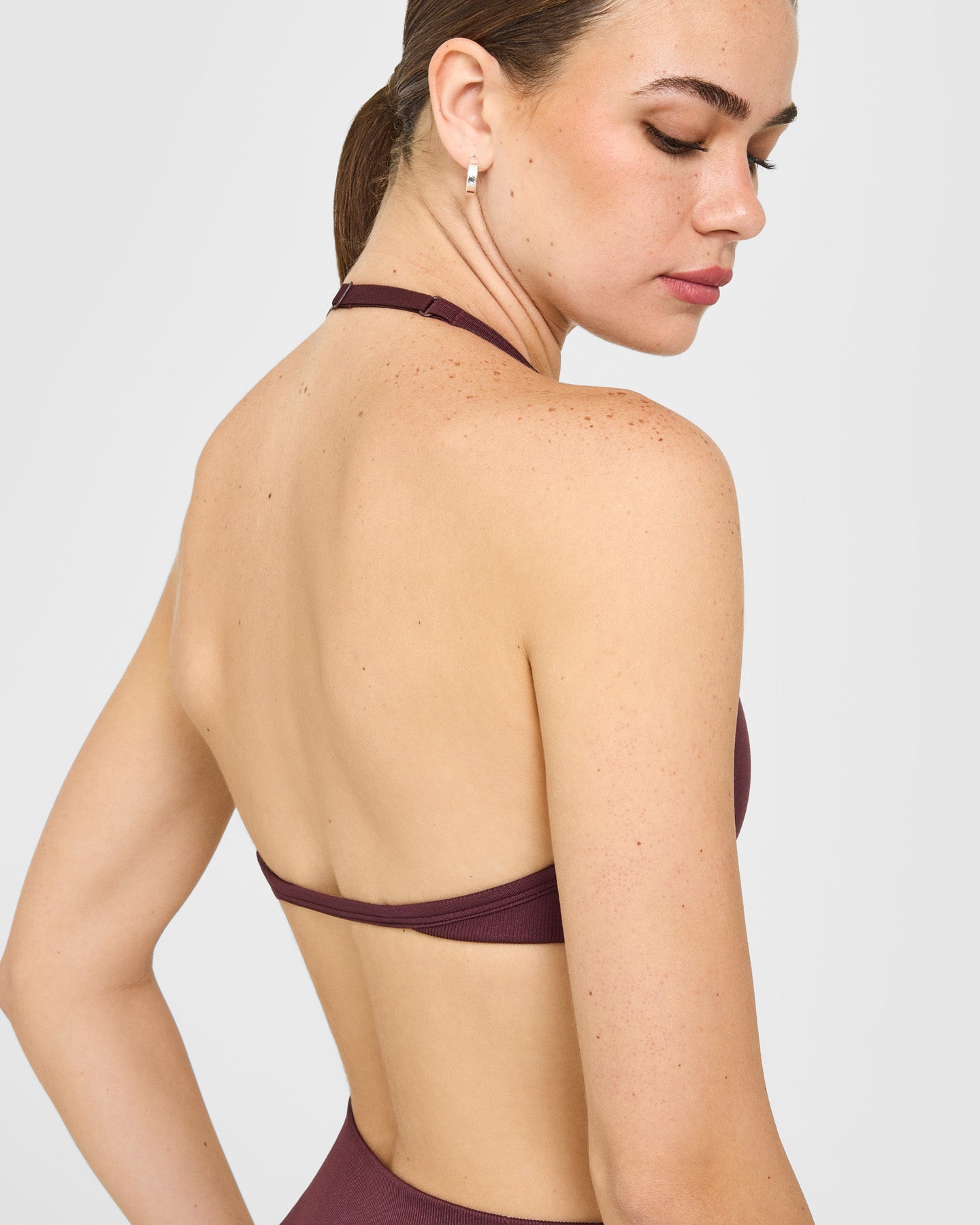 EnhanceLift™ Seamless Minimal Halter Neck Bralette with White Logo | Velvet Mocha