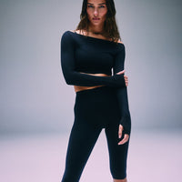 SoftMotion™ High Waisted Capri Leggings with Gray Logo | Black