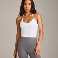 SoftMotion™ Strappy Halter Neck Mid Vest with Built in Bra Shelf with Grey Logo | White