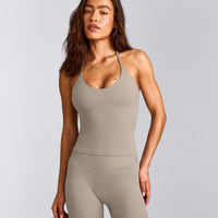 SoftMotion™ Strappy Halter Neck Tank Top with Built in Bra Shelf with White Logo | Warm Sand