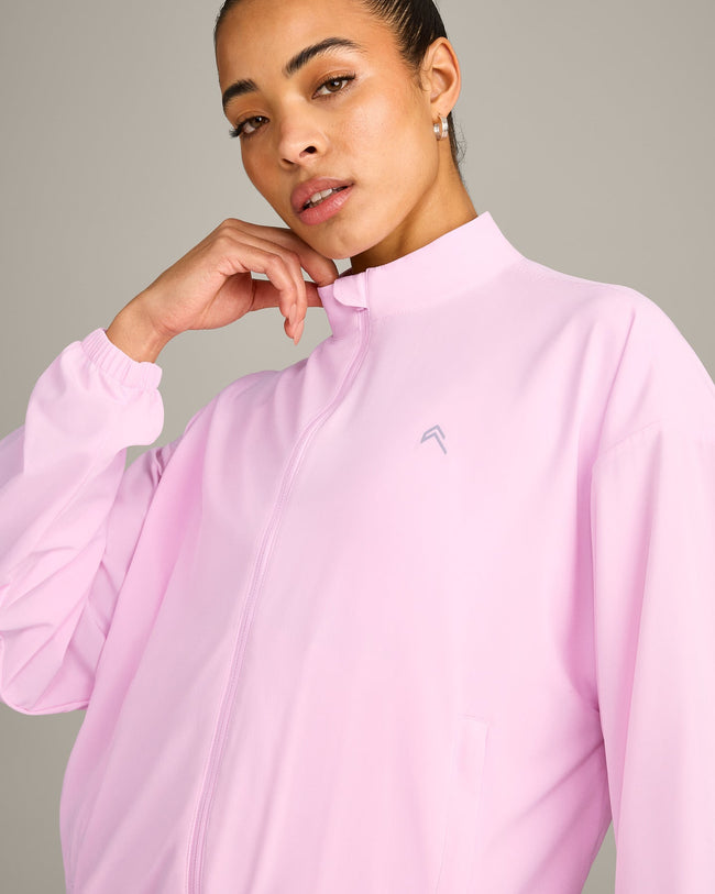 AirMove™ Jacket with Reflective Logo | Chalk Pink