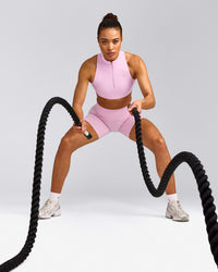 EasyLift™ Zip High Neck Sports Bra with Grey Logo | Chalk Pink