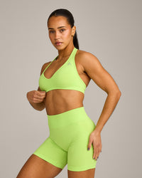 EffortlessLift™ Seamless Halter Neck Sports Bra with Grey Logo | Citrus Green