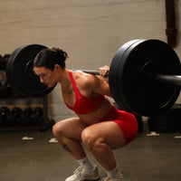 EffortlessLift™ Seamless Halter Neck Sports Bra with Gray Logo | Fiery Red