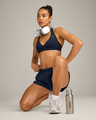 EffortlessLift™ Seamless Halter Neck Sports Bra with Grey Logo | True Blue