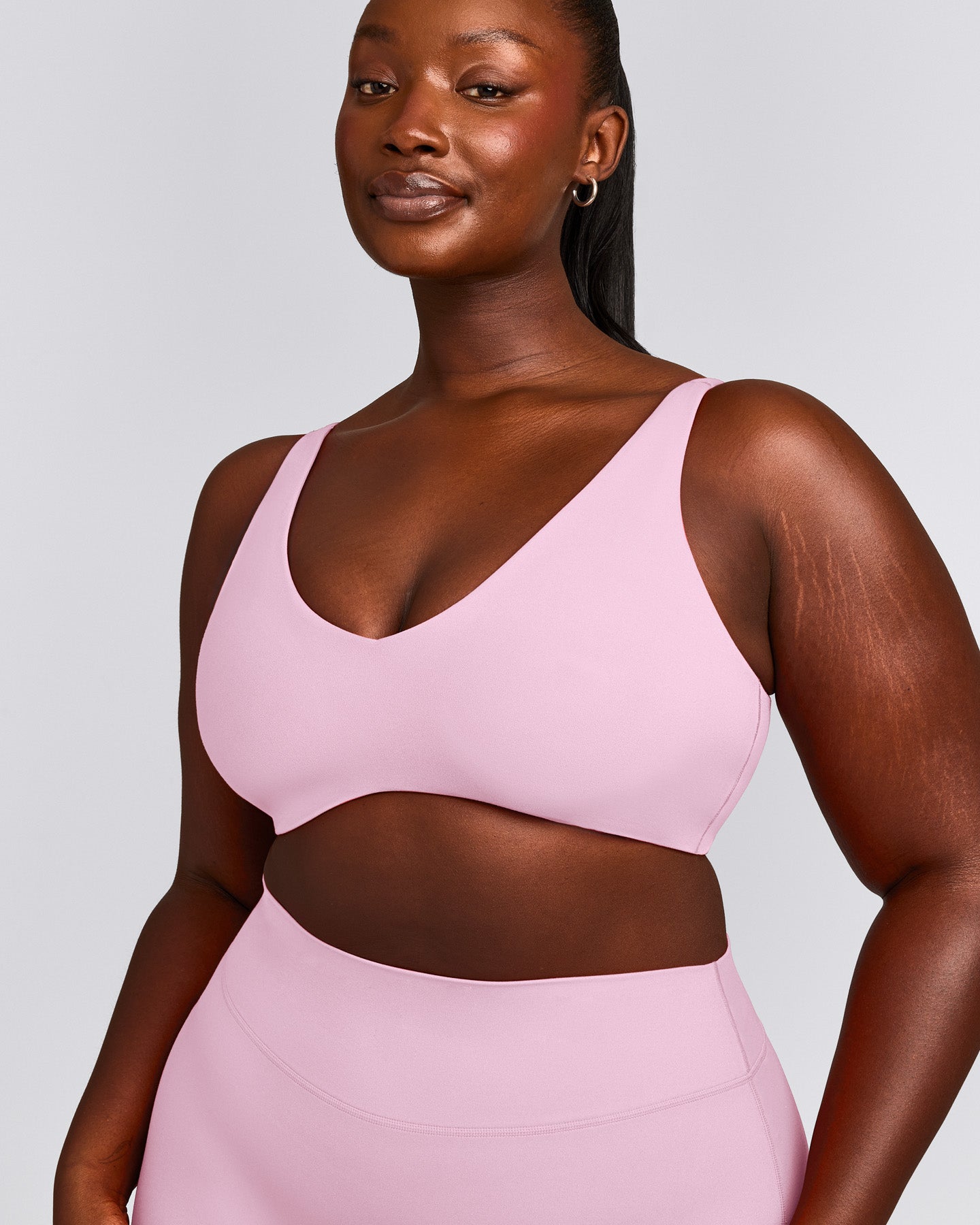 SoftMotion™ Scoop Back Bralette with Grey Logo | Chalk Pink