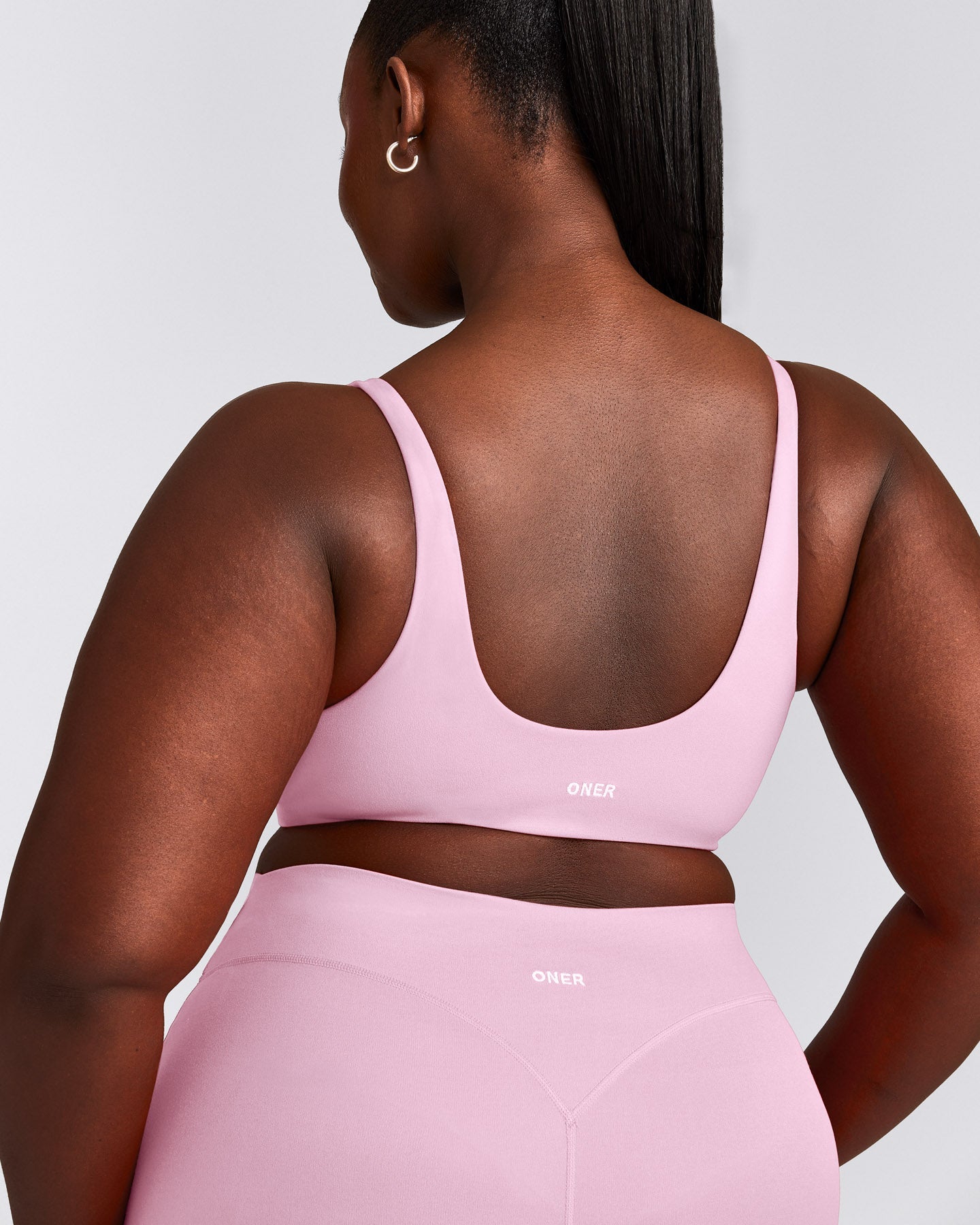 SoftMotion™ Scoop Back Bralette with Grey Logo | Chalk Pink