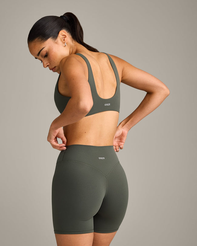 SoftMotion™ Scoop Back Bralette with Grey Logo | Dark Khaki