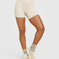 SoftMotion™ High Waisted Shorts 6" with White Logo | Sand