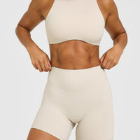 SoftMotion™ High Waisted Shorts 6" with White Logo | Sand