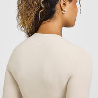 SoftMotion™ Long Sleeve Mid Top with White Logo | Sand