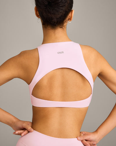 SoftMotion™ High Neck Sports Bra with Grey Logo | Soft Girl Pink