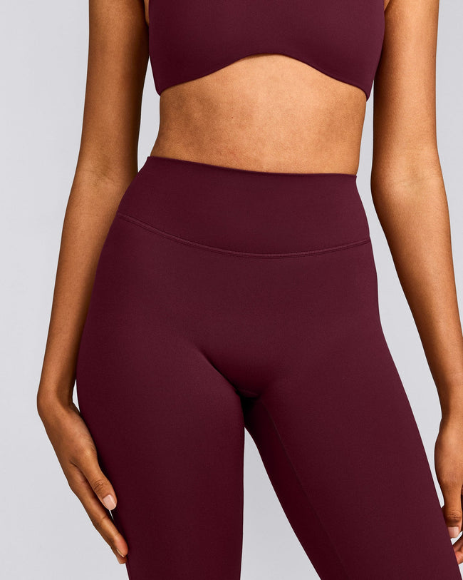 SoftMotion™ Flared Pants with Gray Logo | Cherry Lacquer Purple