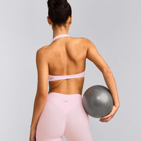 SoftMotion™ Minimal Halter Neck Bralette with Grey Logo | Soft Girl Pink