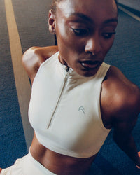 EasyLift™ Zip High Neck Sports Bra with Gray Logo | Marshmallow White
