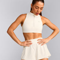 EasyLift™ Zip High Neck Sports Bra with Gray Logo | Marshmallow White