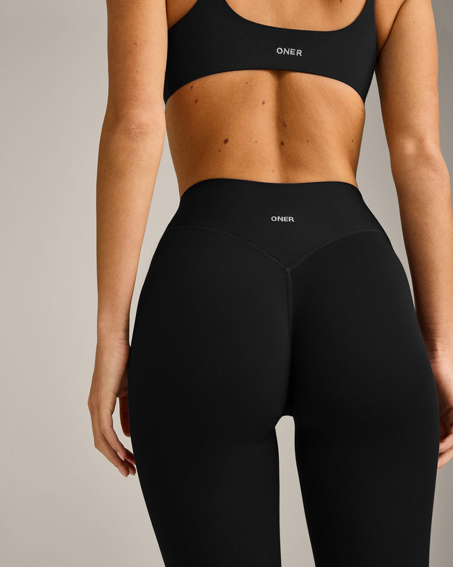 SoftMotion™ 3/4 Length Leggings with Grey Logo | Black