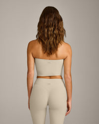 SoftMotion™ Bandeau Mid Vest with Built in Bra Shelf with Grey Logo | Oatmeal