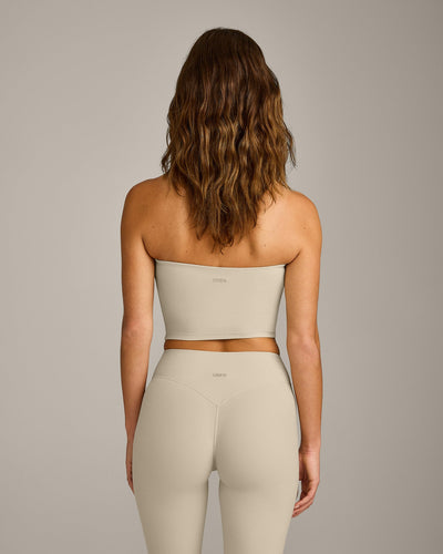 SoftMotion™ Bandeau Mid Vest with Built in Bra Shelf with Grey Logo | Oatmeal