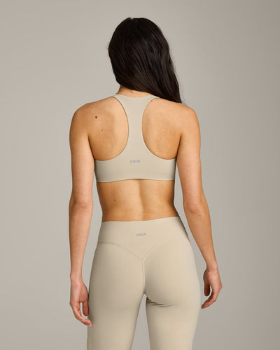 SoftMotion™ Bralette with Grey Logo | Oatmeal