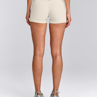 SoftMotion™ Double Layer Mid Rise Shorts 4" with Grey Logo | Marshmallow White