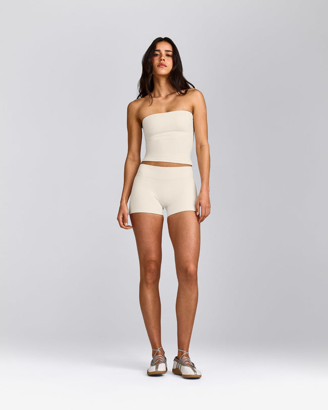 SoftMotion™ Double Layer Mid Rise Shorts 4" with Grey Logo | Marshmallow White