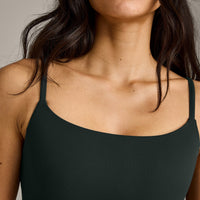 SoftMotion™ Strappy Sports Bra with Grey Logo | Emerald Noir