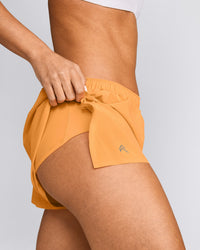 AirMove™ Lined Shorts 2" with Pocket | Powdered Orange