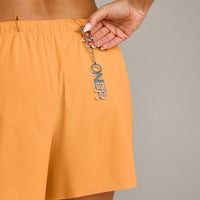 AirMove™ Lined Shorts 4" with Pocket and Reflective Logo | Powdered Orange