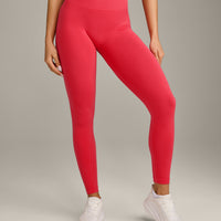 EffortlessLift™ Seamless Mid Rise Leggings with Grey Logo | Charged Pink