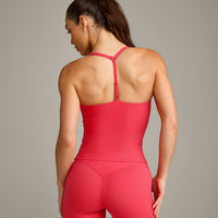 UnifiedMove™ T Back Mid Vest with Built in Bra Shelf with Reflective Logo | Charged Pink