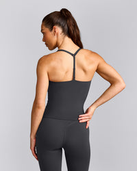 UnifiedMove™ T Back Mid Tank Top with Built in Bra Shelf with Reflective Logo | Coal