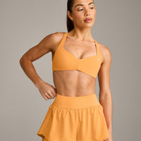 UnifiedMove™ T Back Minimal Bralette with Reflective Logo | Powdered Orange