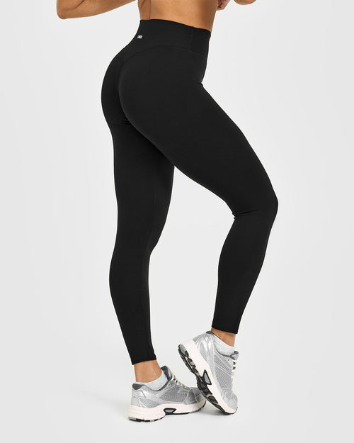 SoftMotion™ High Waisted Leggings with White Logo | Black