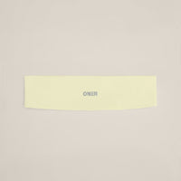 SoftMotion™ Headband with Grey Logo | Pastel Yellow