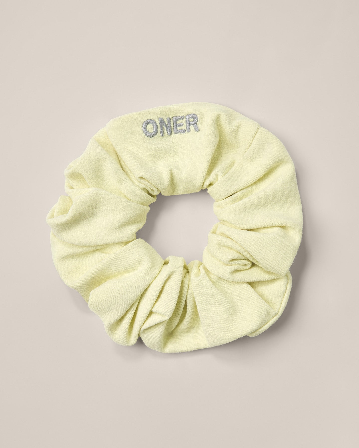 SoftMotion™ Scrunchie with Grey Logo | Pastel Yellow
