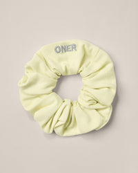 SoftMotion™ Scrunchie with Grey Logo | Pastel Yellow
