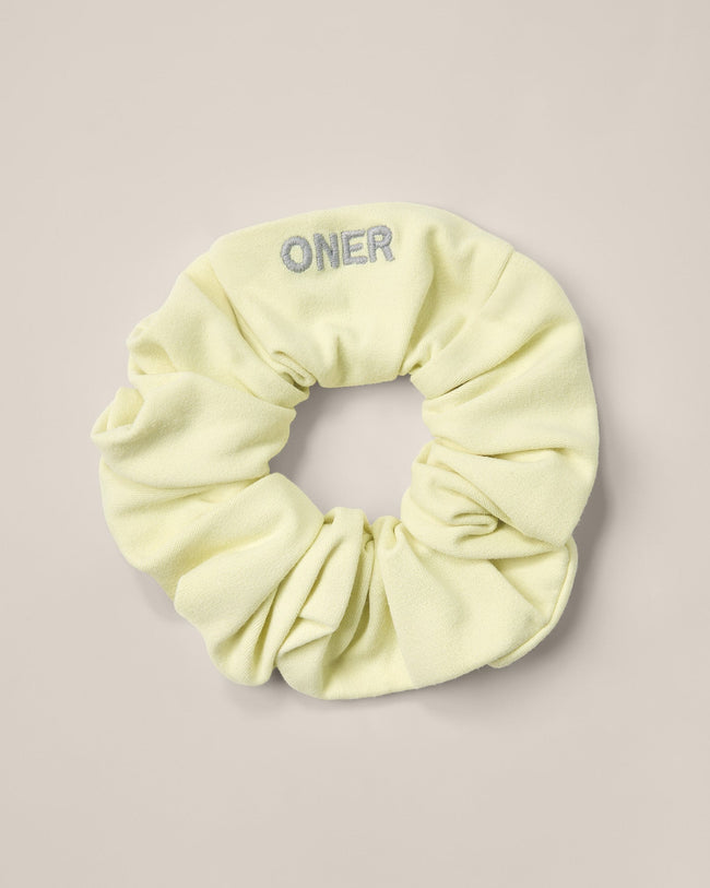 SoftMotion™ Scrunchie with Grey Logo | Pastel Yellow