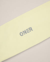 SoftMotion™ Headband with Grey Logo | Pastel Yellow