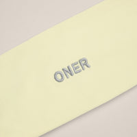 SoftMotion™ Headband with Grey Logo | Pastel Yellow