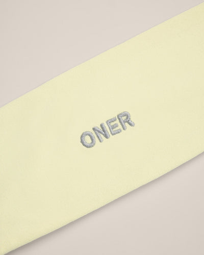 SoftMotion™ Headband with Grey Logo | Pastel Yellow