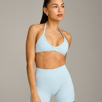 EnhanceLift™ Seamless Minimal Halter Neck Bralette with Grey Logo | Cloud Blue