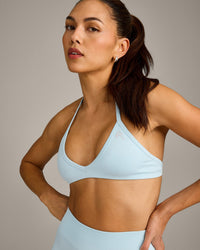 EnhanceLift™ Seamless Minimal Halter Neck Bralette with Grey Logo | Cloud Blue